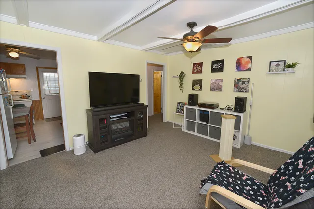 a kitchen with a sink and a refrigerator