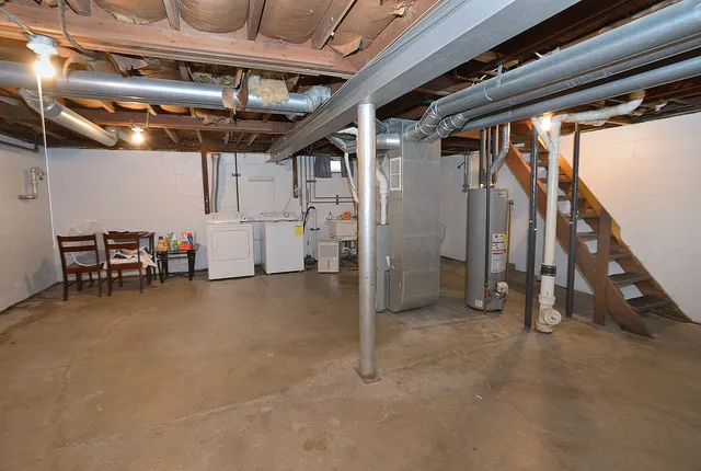 a swimming pool with outdoor seating and yard