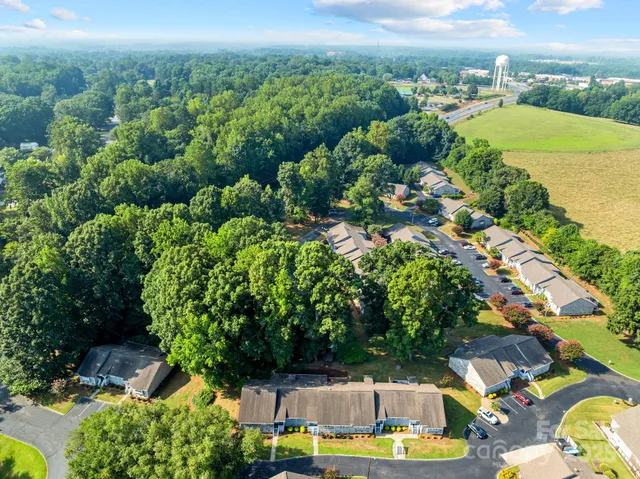 an aerial view of a house with a garden