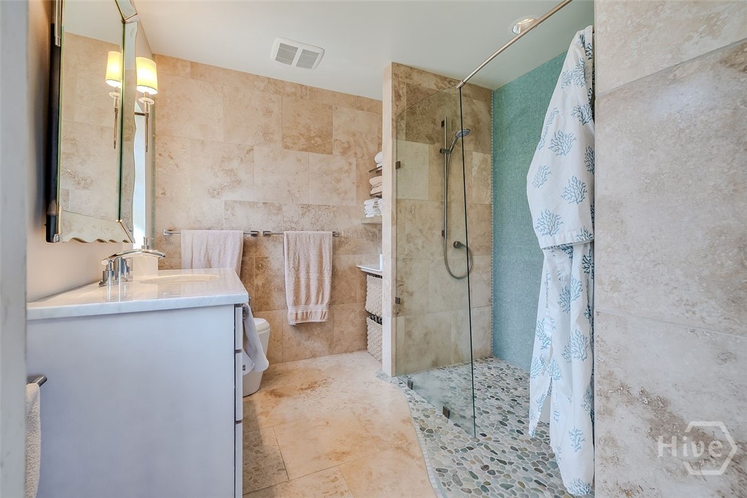 211 Runaway Point Road Savannah, GA 31404 - Photo 28 of 56 Another view of the fully tiled primary bath.