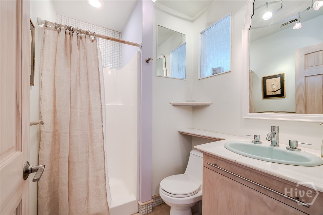 211 Runaway Point Road Savannah, GA 31404 - Photo 33 of 56 The second bath showing the single vanity and the