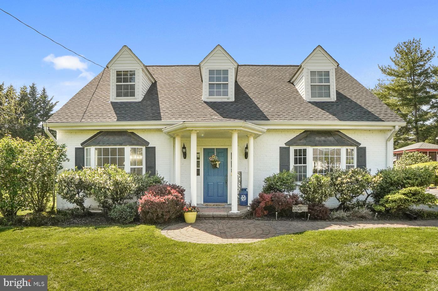 The perfect Cape Cod with even better curb appeal!