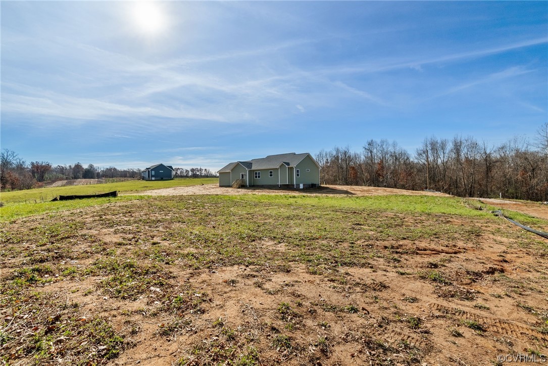 326 Moore Road Farmville, VA 23901 - Photo 20 of 50 a view of a large body of water with a building in the background