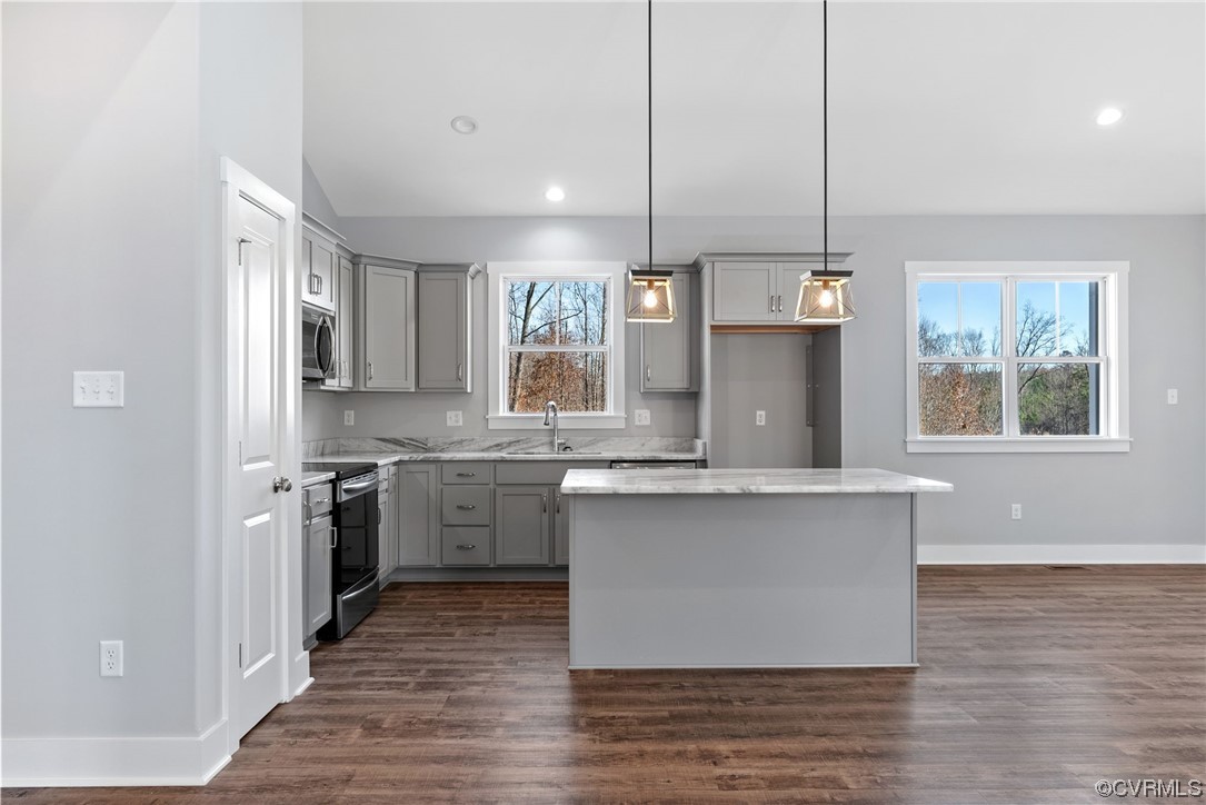 326 Moore Road Farmville, VA 23901 - Photo 24 of 50 a kitchen with stainless steel appliances granite countertop a kitchen island hardwood floor sink stove and granite counter top