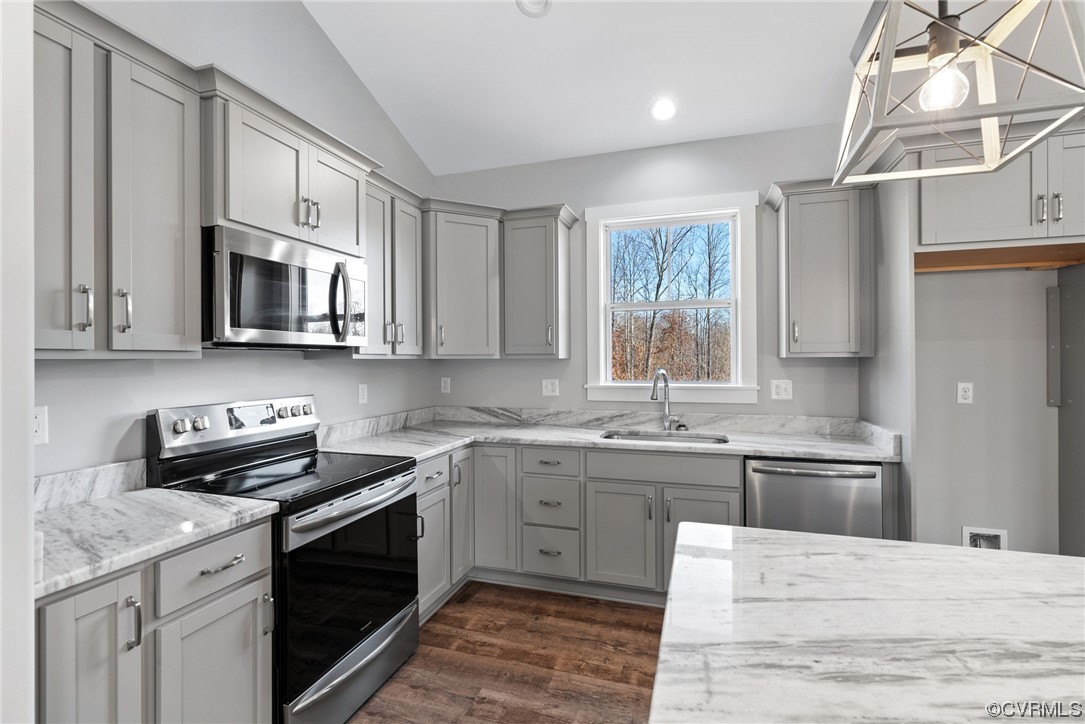 326 Moore Road Farmville, VA 23901 - Photo 26 of 50 a kitchen with stainless steel appliances granite countertop a stove a sink and a microwave