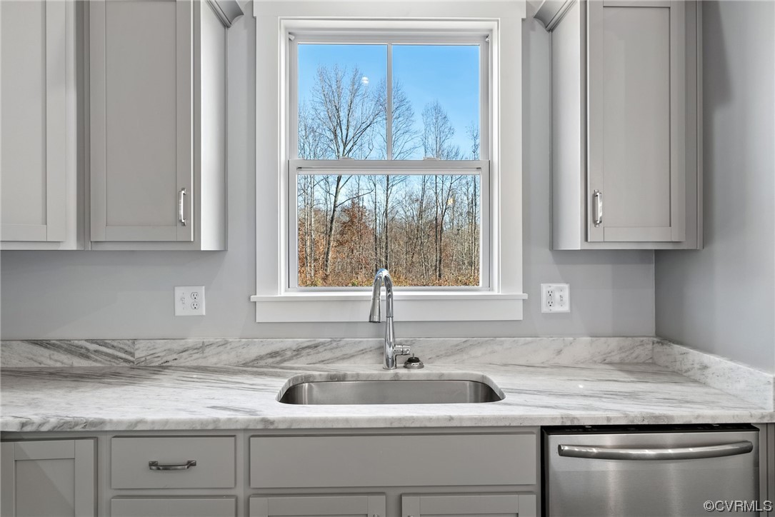 326 Moore Road Farmville, VA 23901 - Photo 27 of 50 a kitchen with granite countertop white cabinets and a sink