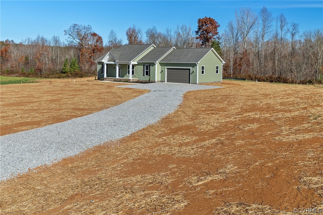 326 Moore Road Farmville, VA 23901 - Photo 5 of 50 a front view of a house with a yard