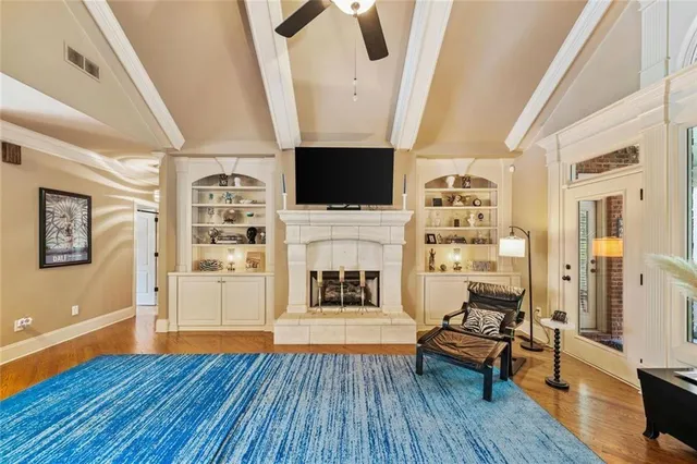 a kitchen with sink stove and refrigerator