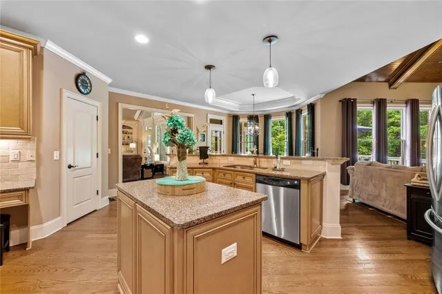 a bedroom with a large bed and a large window with the outer view