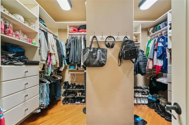 a view of a dining room with furniture and a chandelier