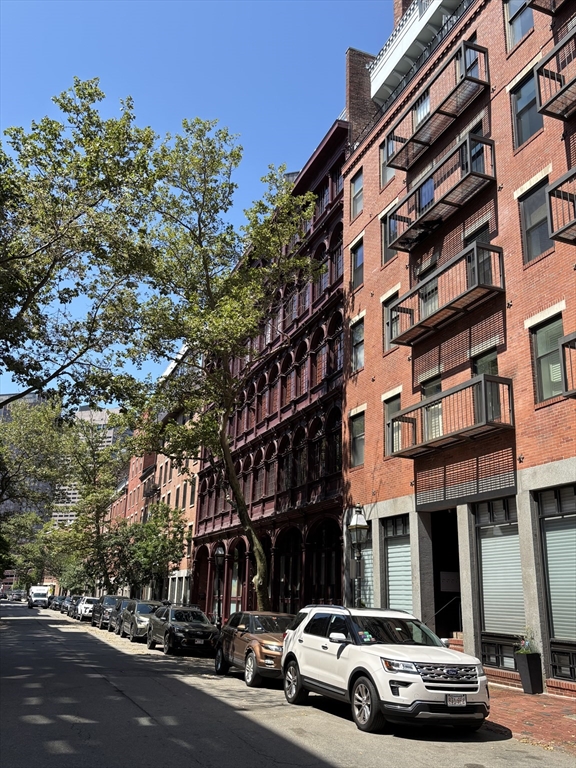 a car parked in front of a building
