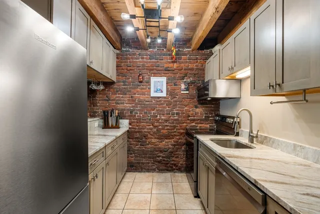 a bedroom with a bed and a cabinets