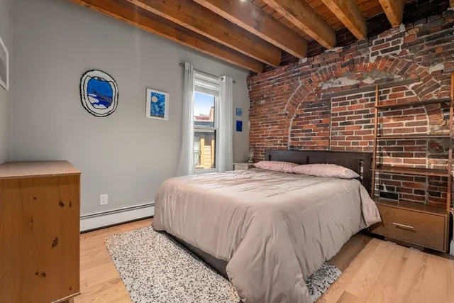 a room with furniture and a window