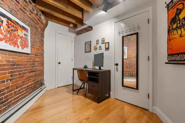 a bathroom with a sink and mirror