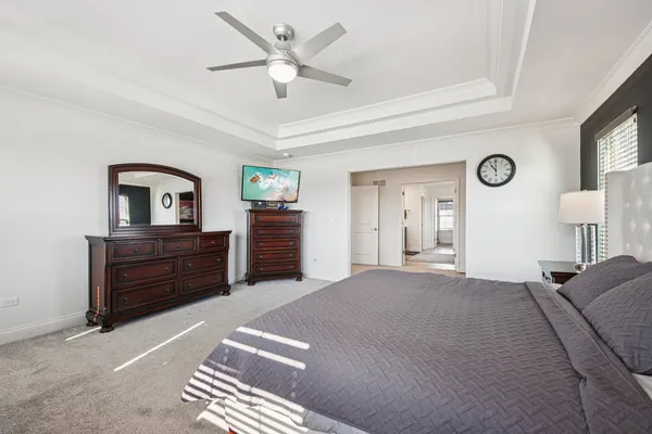 a view of a livingroom with furniture and windows