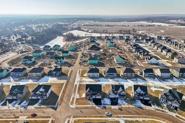 a view of a swimming pool and a yard