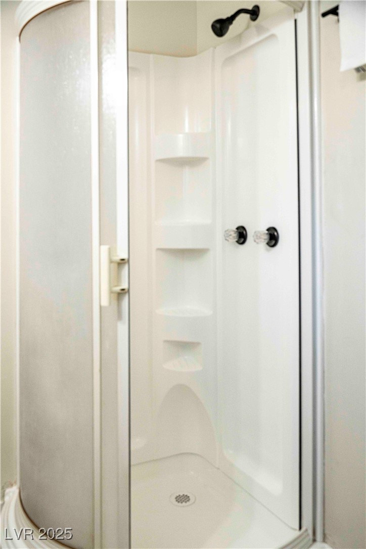 238 Kansas Avenue Henderson, NV 89015 - Photo 33 of 61 Full bathroom featuring a stall shower