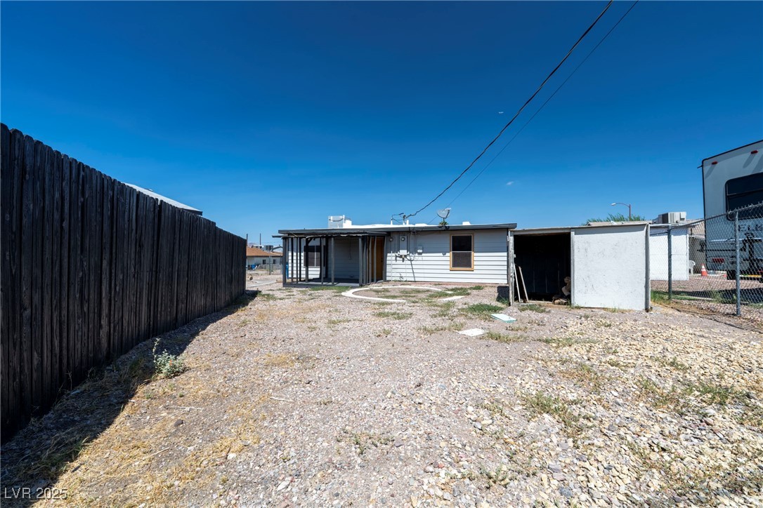 238 Kansas Avenue Henderson, NV 89015 - Photo 39 of 61 Rear view of property with a sunroom
