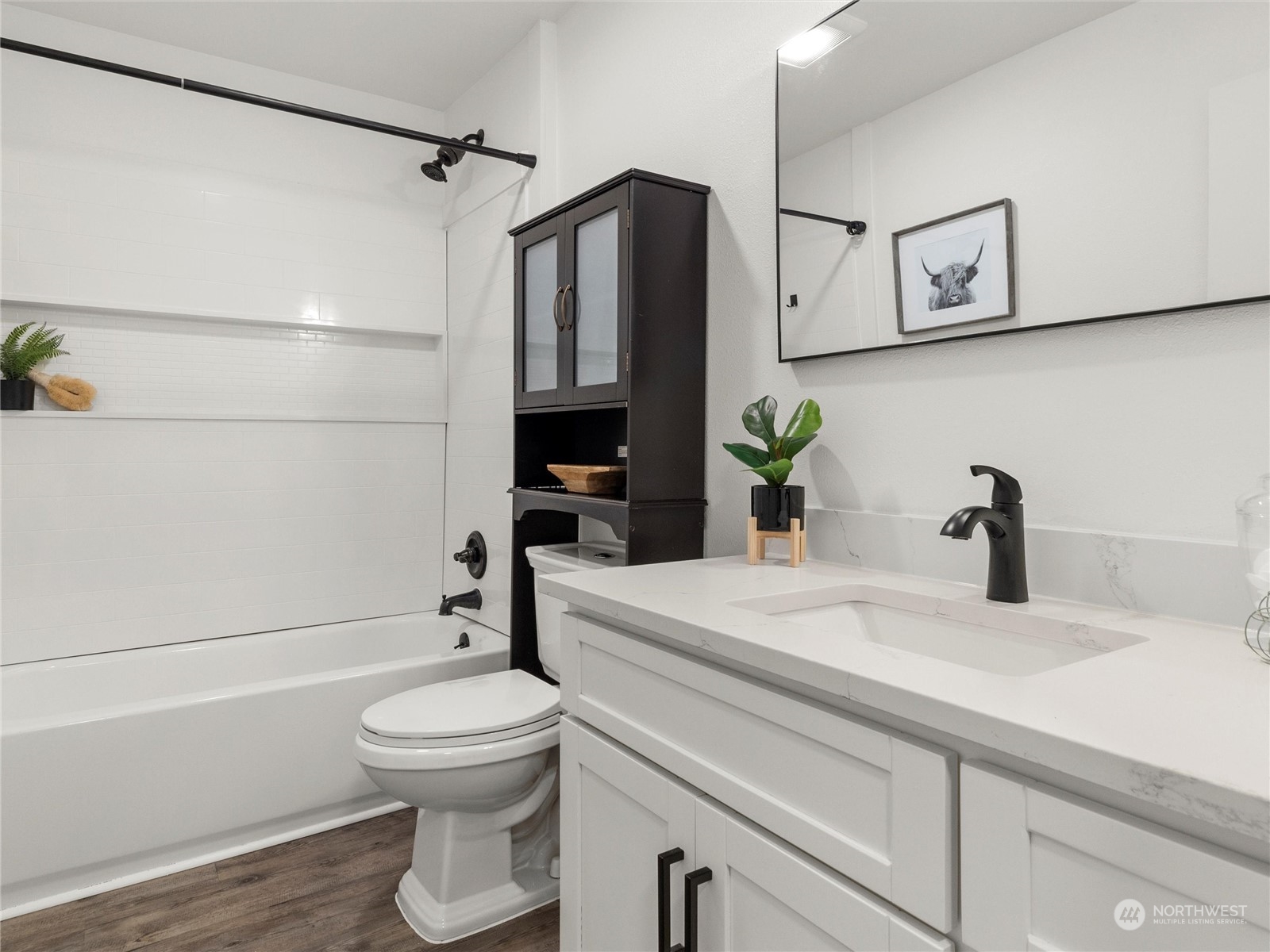 9331 Cullens Road Southeast Yelm, WA 98597 - Photo 13 of 28 a bathroom with a sink a toilet and shower