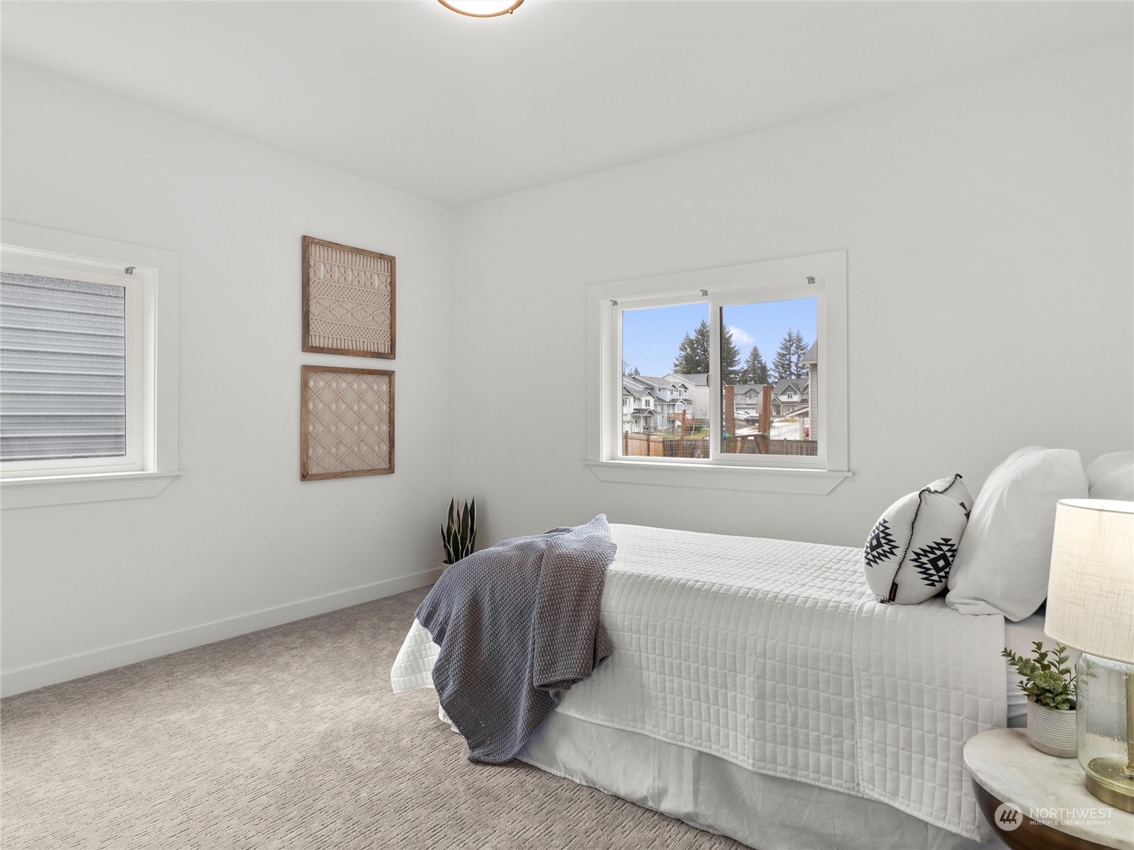 9331 Cullens Road Southeast Yelm, WA 98597 - Photo 14 of 28 a bedroom with a bed and a couch