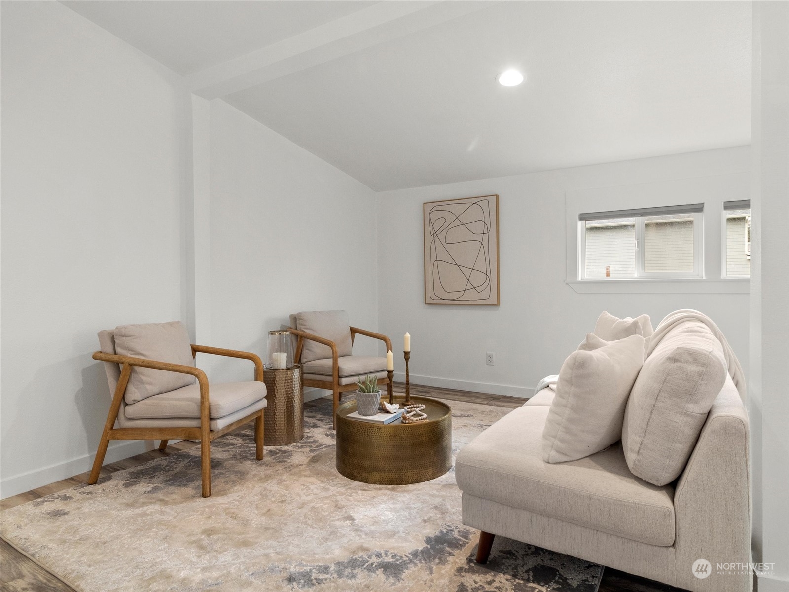 9331 Cullens Road Southeast Yelm, WA 98597 - Photo 16 of 28 a living room with furniture and a chair