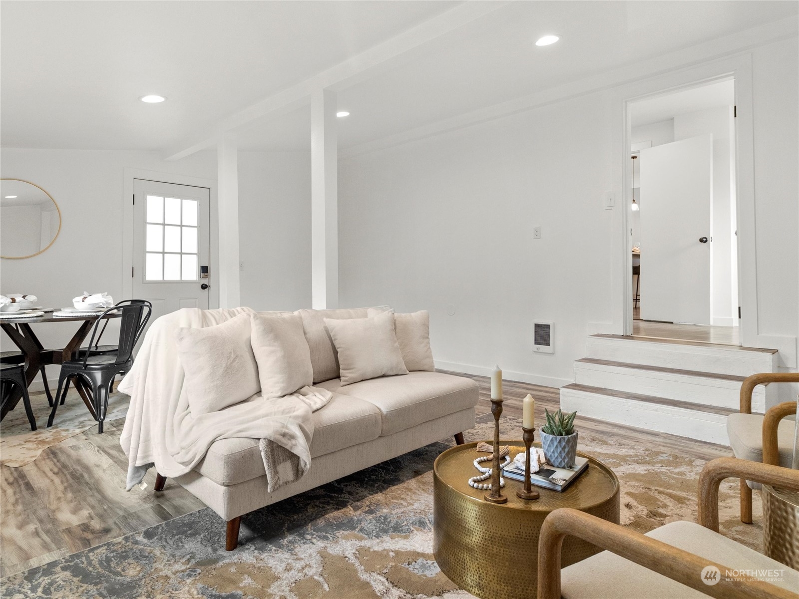 9331 Cullens Road Southeast Yelm, WA 98597 - Photo 17 of 28 a living room with furniture and wooden floor