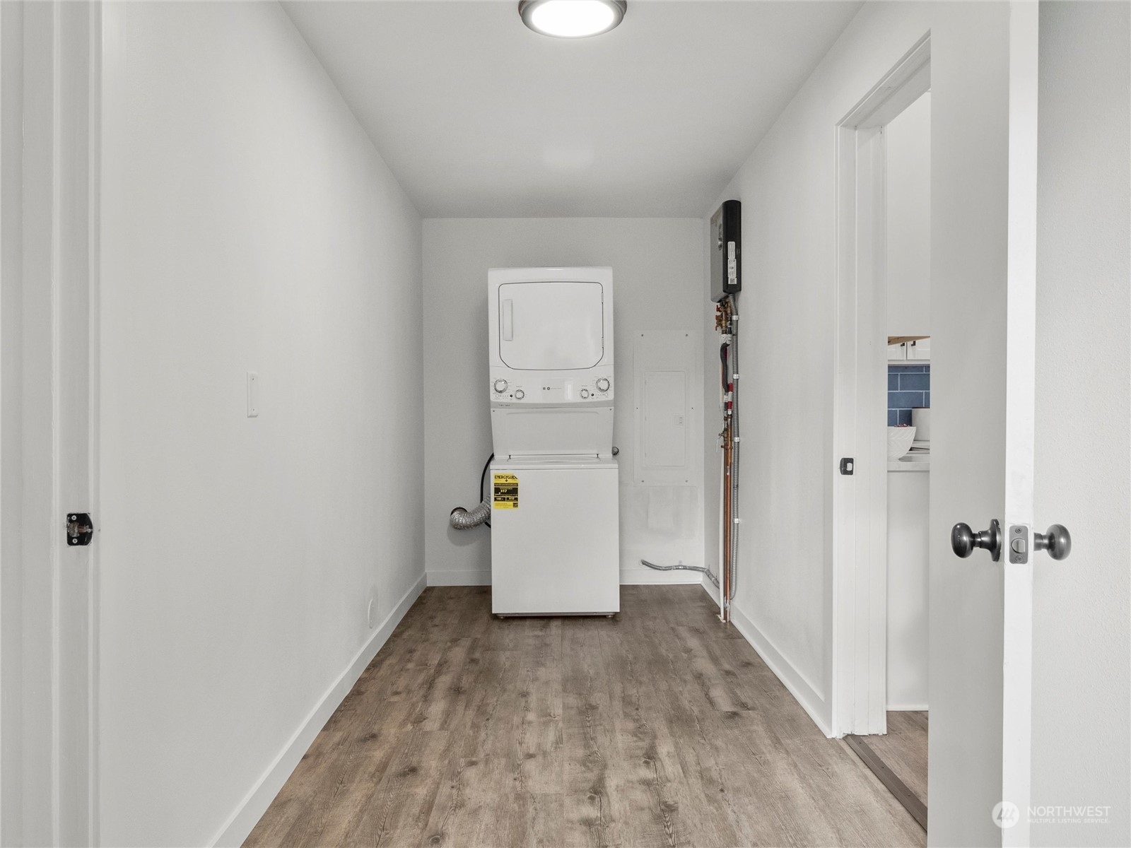 9331 Cullens Road Southeast Yelm, WA 98597 - Photo 19 of 28 wooden floor in an empty room