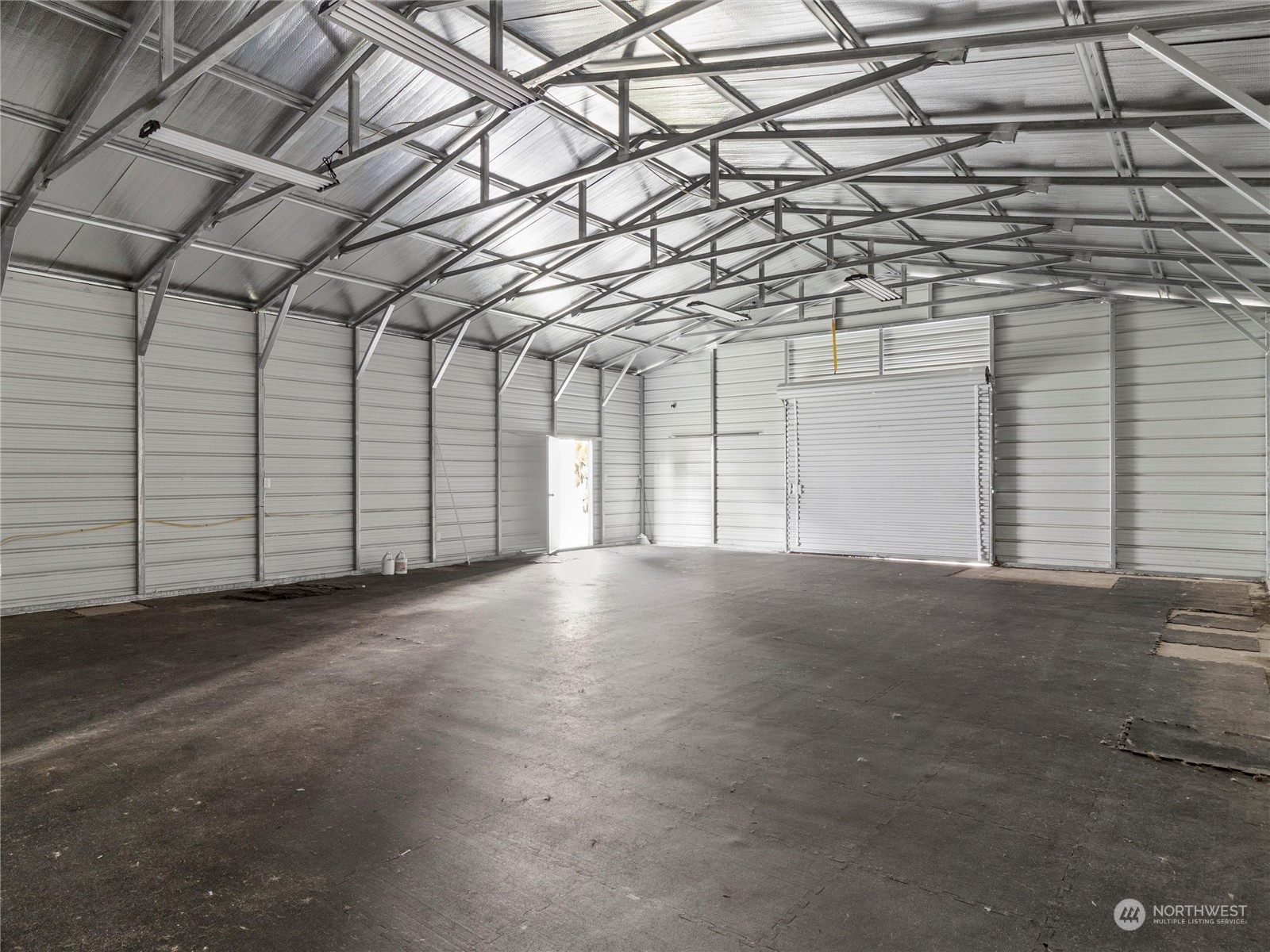 9331 Cullens Road Southeast Yelm, WA 98597 - Photo 26 of 28 a view of a garage
