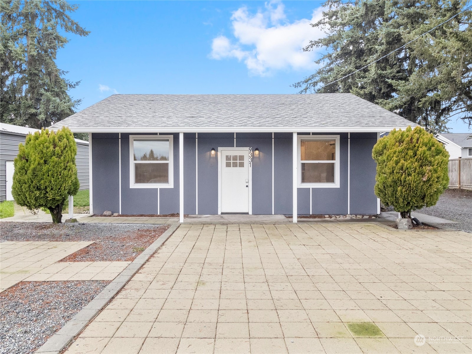 9331 Cullens Road Southeast Yelm, WA 98597 - Photo 28 of 28 a view of a house with a backyard