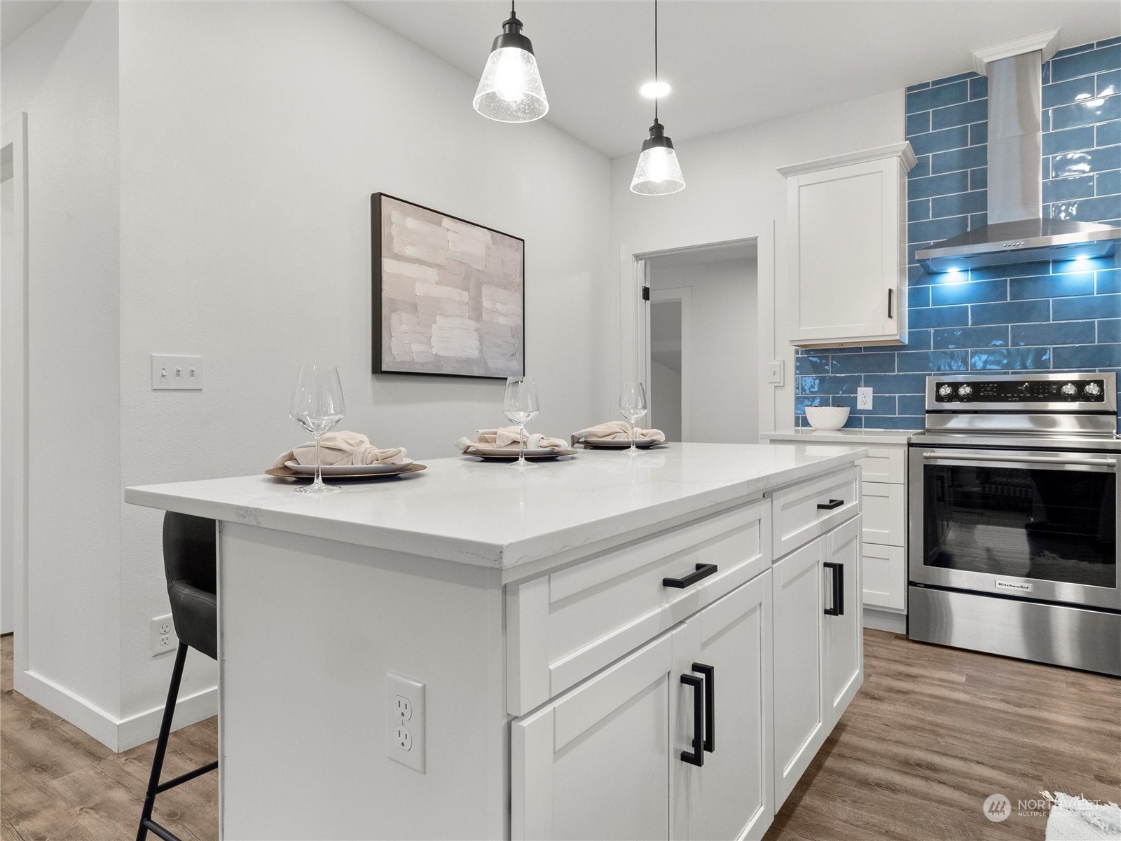 9331 Cullens Road Southeast Yelm, WA 98597 - Photo 9 of 28 a kitchen with cabinets appliances and a counter space