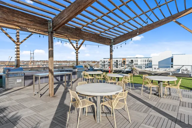 a view of a chairs and table in the patio