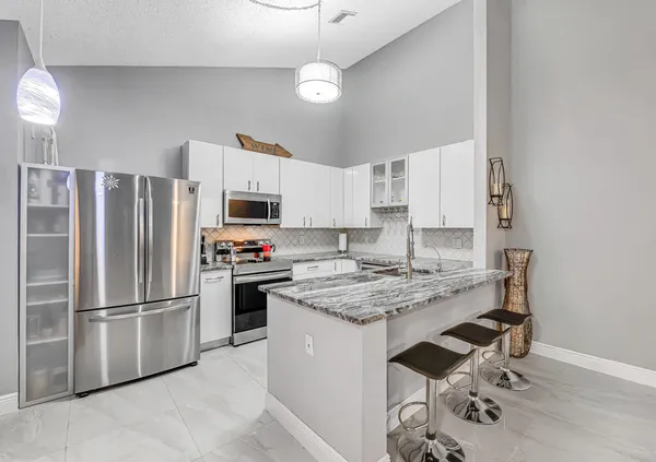 $379,000 | 8888 Thumbwood Circle, Unit B, Boynton Beach, FL 33436