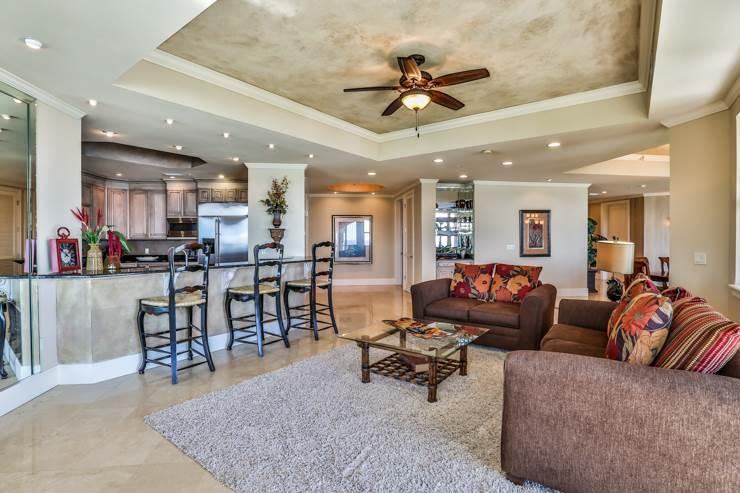 50 Surf Song Lane, Unit E514 Miramar Beach, FL 32550 - Photo 11 of 28 a living room with furniture and kitchen view