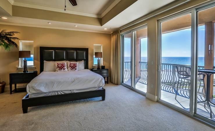 50 Surf Song Lane, Unit E514 Miramar Beach, FL 32550 - Photo 15 of 28 a spacious bedroom with a bed and a window