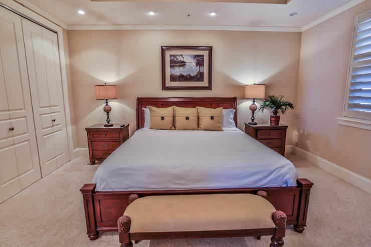 50 Surf Song Lane, Unit E514 Miramar Beach, FL 32550 - Photo 17 of 28 a bed sitting in a bedroom next to a window