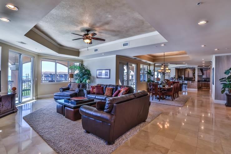50 Surf Song Lane, Unit E514 Miramar Beach, FL 32550 - Photo 6 of 28 a living room with furniture kitchen view and a large window