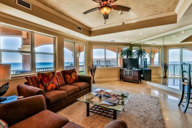 50 Surf Song Lane, Unit E514 Miramar Beach, FL 32550 - Photo 9 of 28 a living room with furniture and a large window with garden view