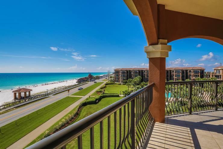 50 Surf Song Lane, Unit E514 Miramar Beach, FL 32550 - Photo 10 of 28 a view of a balcony with two chairs and a table