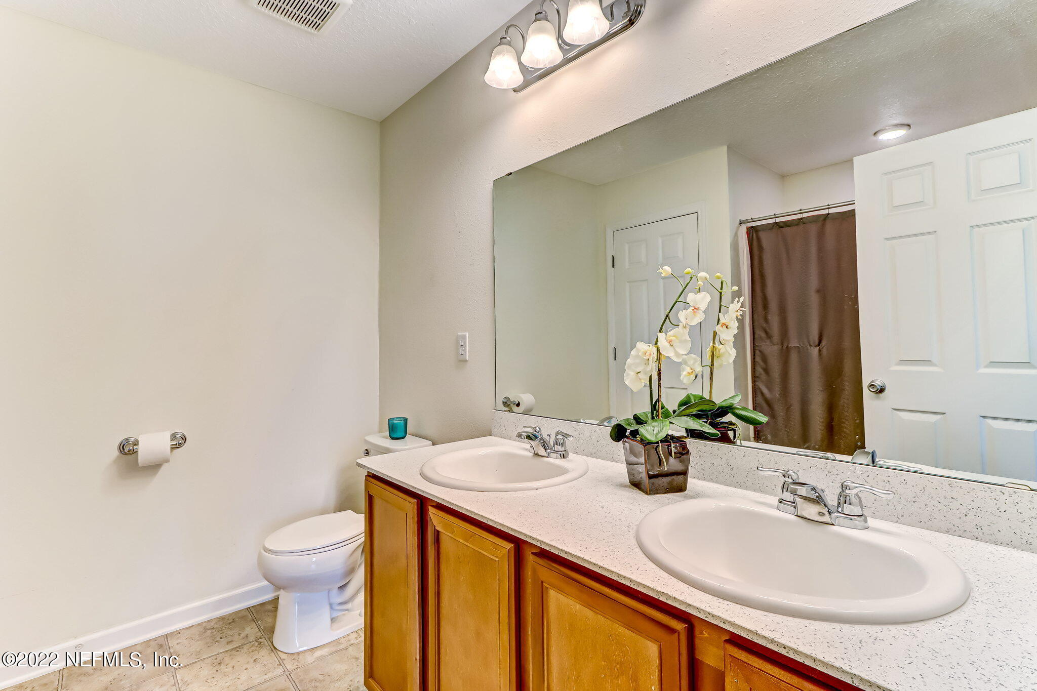 8287 Fouraker Forest Road Jacksonville, FL 32221 - Photo 13 of 22 The primary bath boasts two sinks