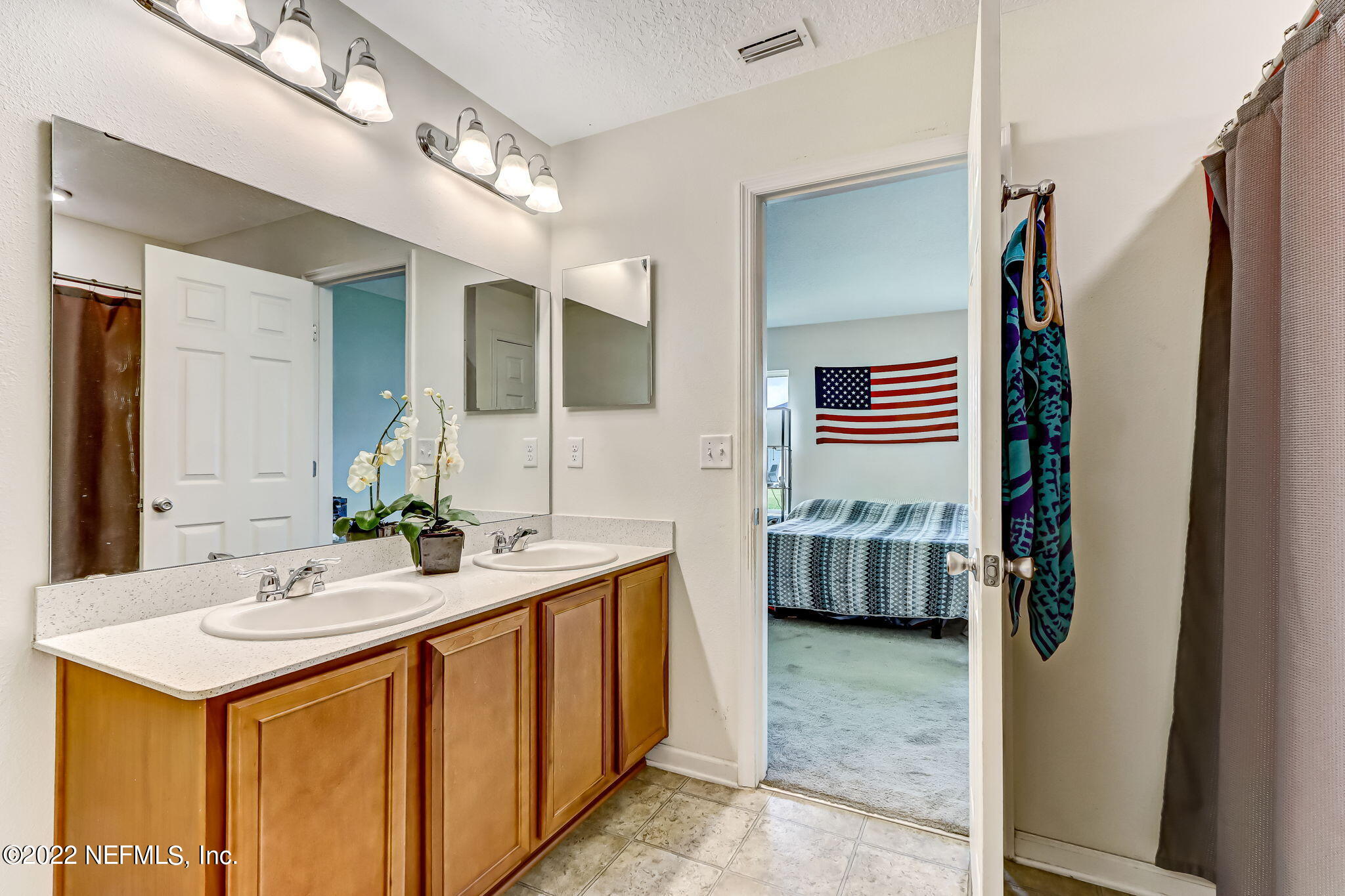 8287 Fouraker Forest Road Jacksonville, FL 32221 - Photo 14 of 22 a large linen closet and a tub/shower