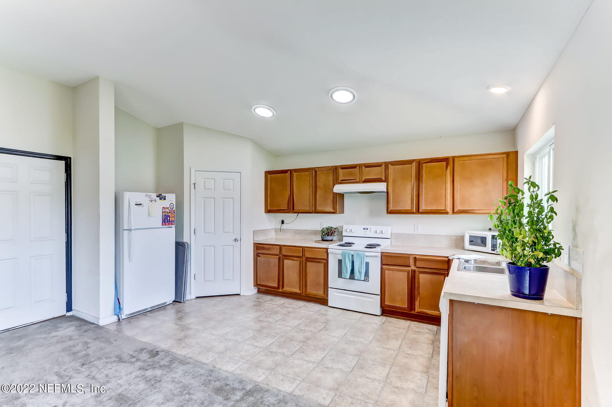 8287 Fouraker Forest Road Jacksonville, FL 32221 - Photo 6 of 22 The kitchen is open
