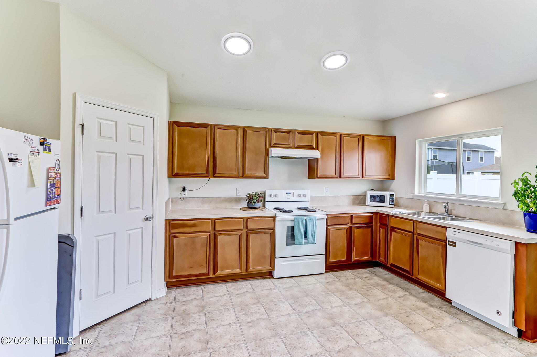 8287 Fouraker Forest Road Jacksonville, FL 32221 - Photo 8 of 22 A walk-in pantry provides extra storage