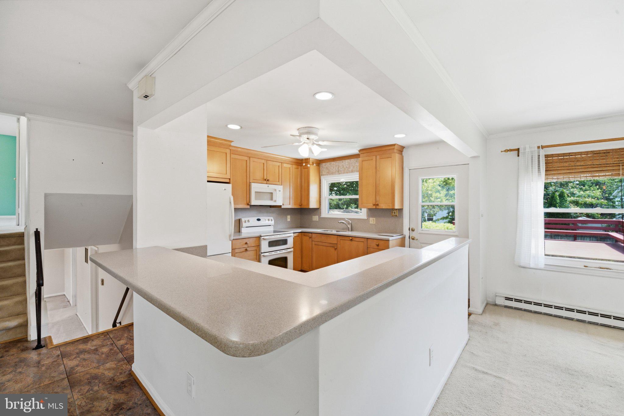 1206 East Iberia Road Sterling, VA 20164 - Photo 8 of 48 Bar seating in the kitchen.