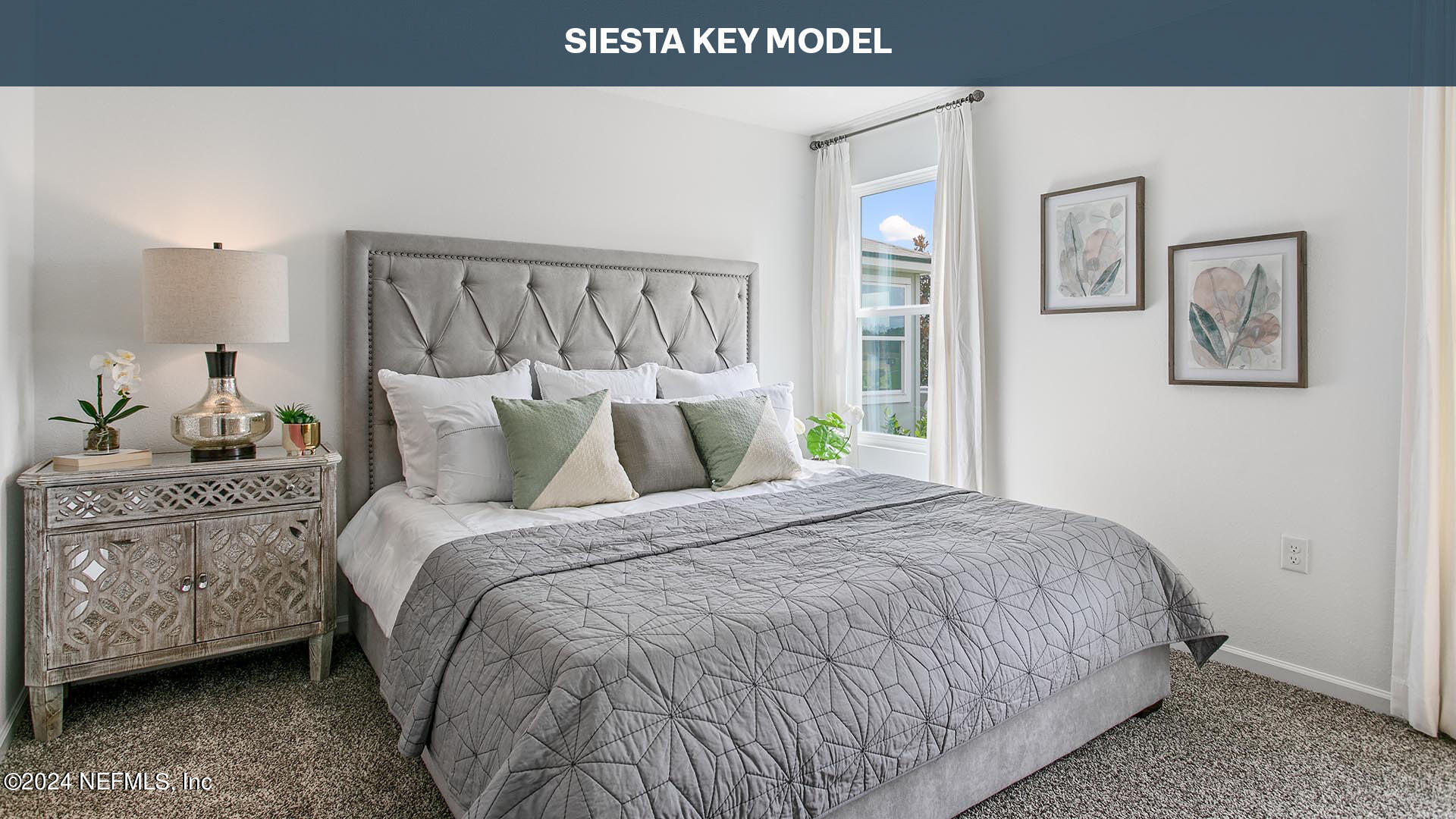 12355 Great Eagle Road Jacksonville, FL 32219 - Photo 11 of 47 a bedroom with a bed and painting on the wall