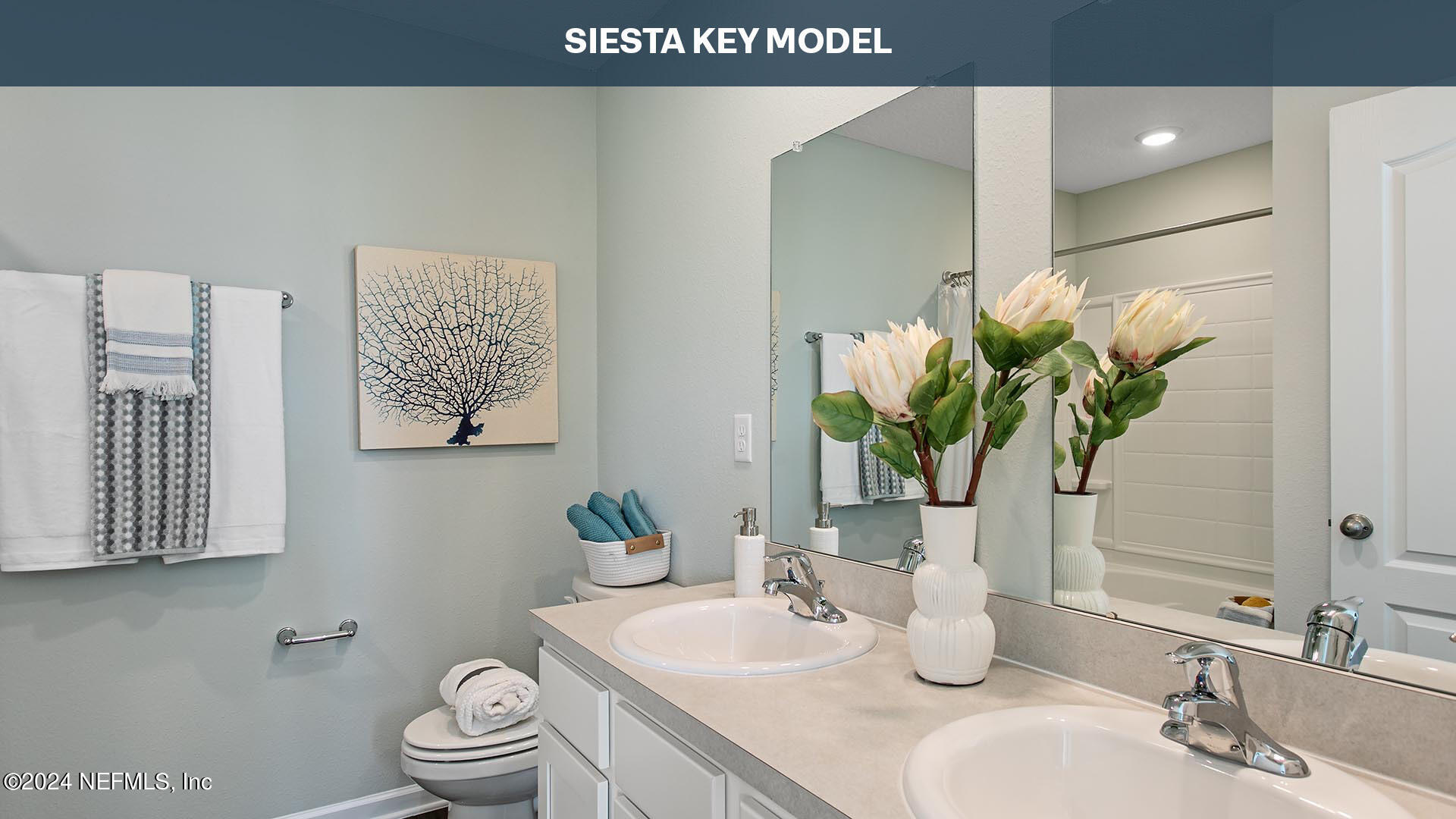 12355 Great Eagle Road Jacksonville, FL 32219 - Photo 13 of 47 a bathroom with a toilet sink and mirror