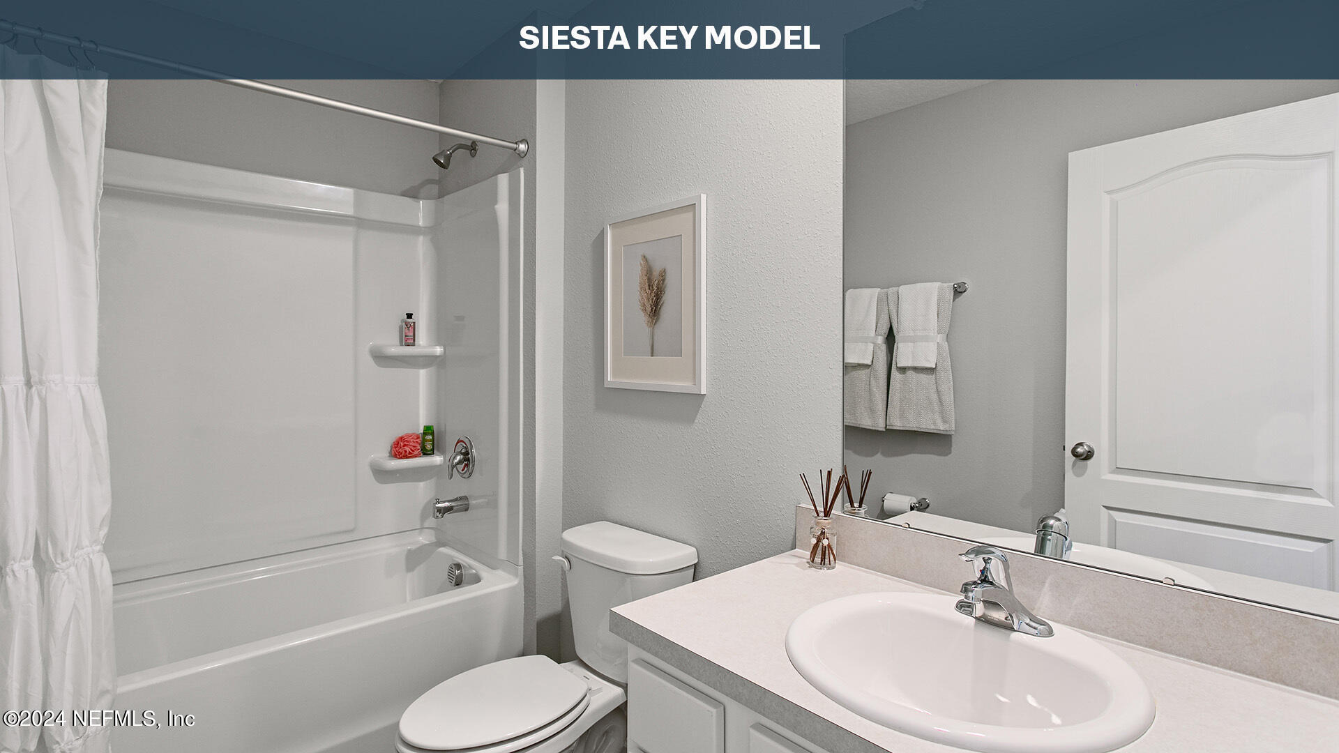 12355 Great Eagle Road Jacksonville, FL 32219 - Photo 17 of 47 a bathroom with a sink toilet and shower