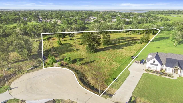 a view of a swimming pool with a balcony