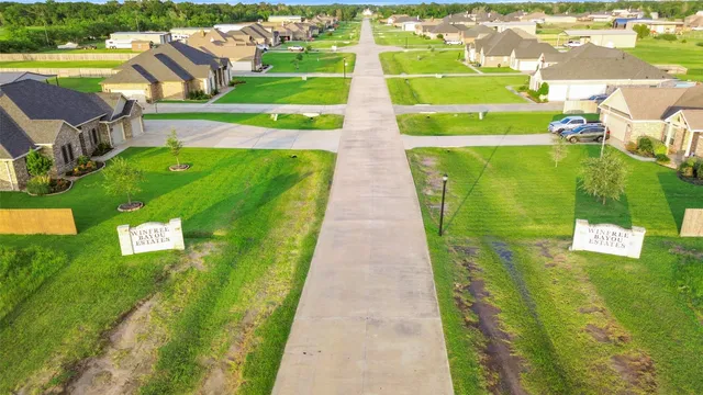 a view of a swimming pool with a garden