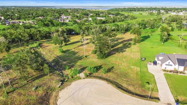 a view of a lake with a yard