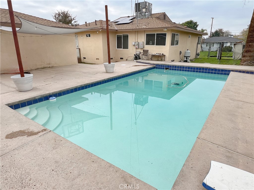 3013 Cornell Street Bakersfield, CA 93305 - Photo 15 of 20 a front view of house with yard and outdoor seating
